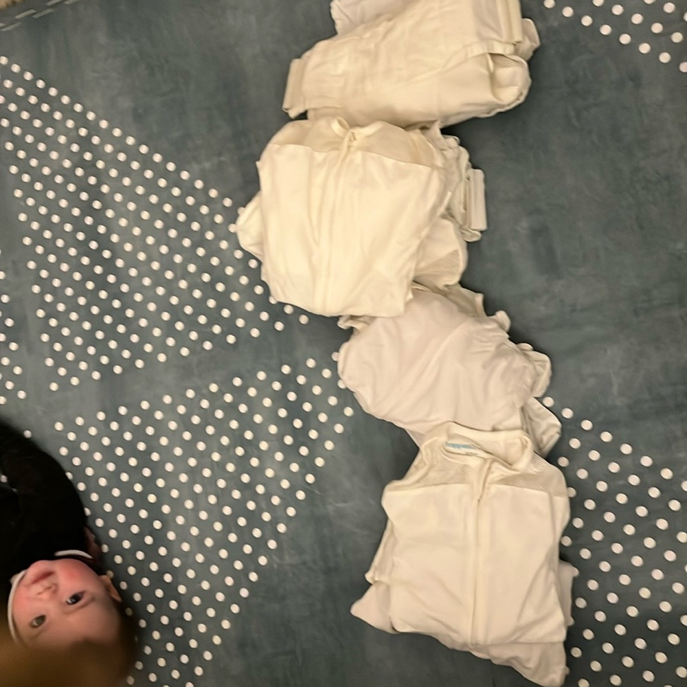 Bundle of lightly used 9 snoo swaddles. 4 small. 3 medium. 2 large.